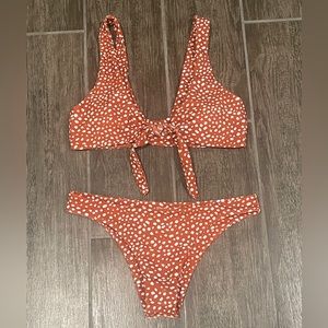 Red and white polka dot tie front bikini